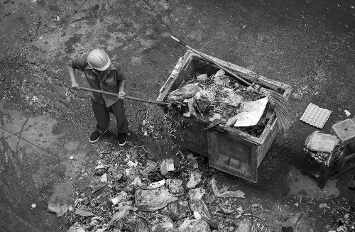 Photograph of office clearance team starting a tidy-up in an office